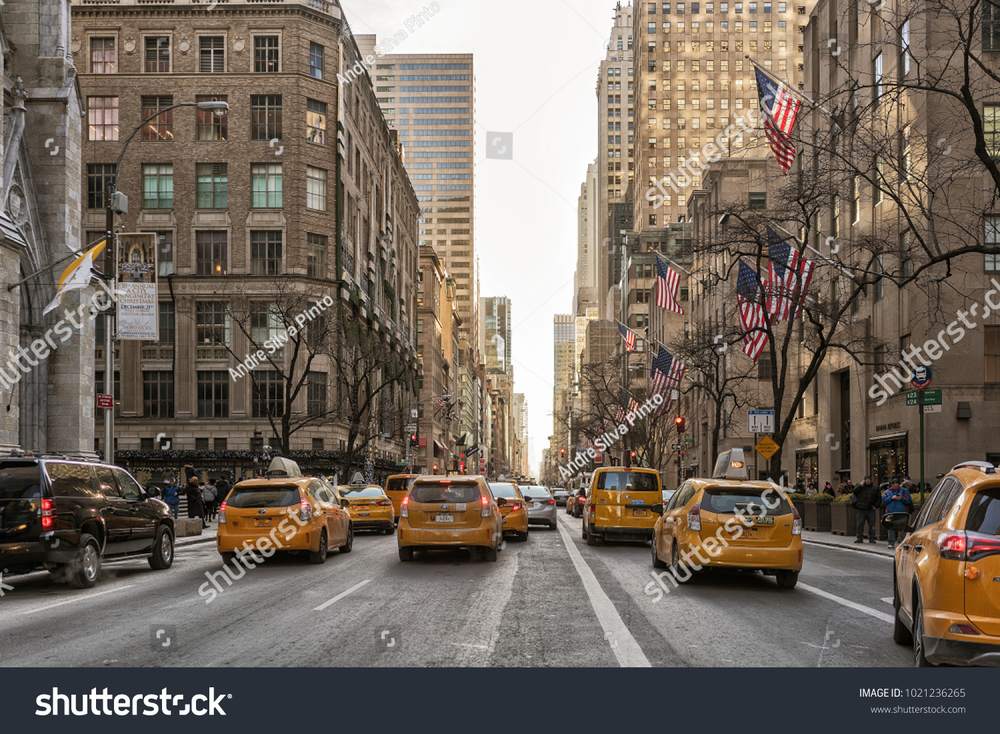 A Manhattan avenue opening toward the sky